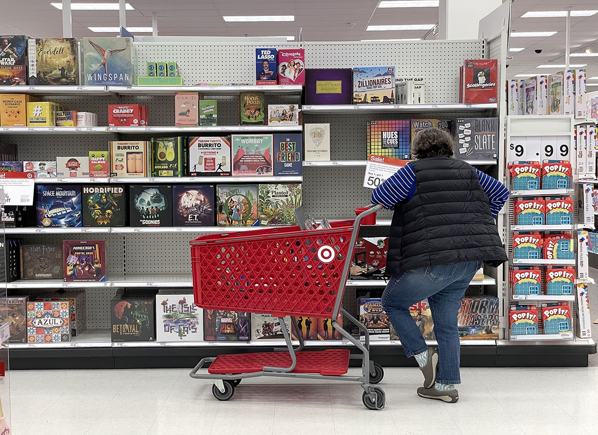 Photo: A customer looks at a display of board games in San Francisco. Photographer: Justin Sullivan/Getty Images