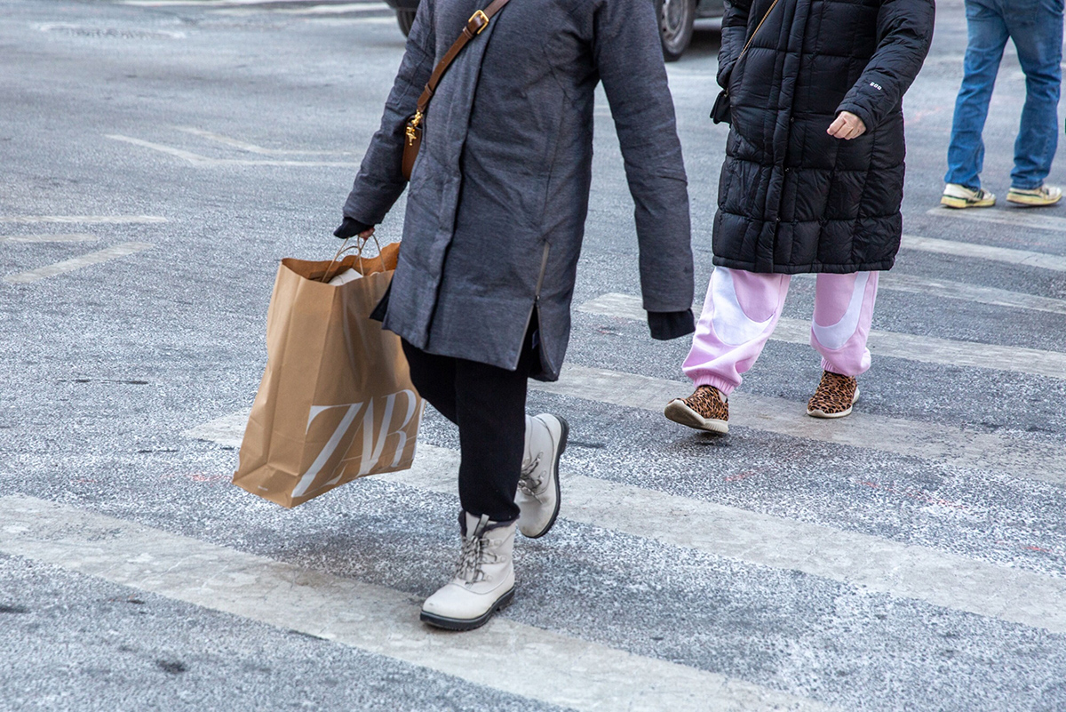 Photo: A shopper carries a Zara bag in the Soho neighborhood of New York City on January 22, 2024. Photographer: Shelby Knowles/Bloomberg