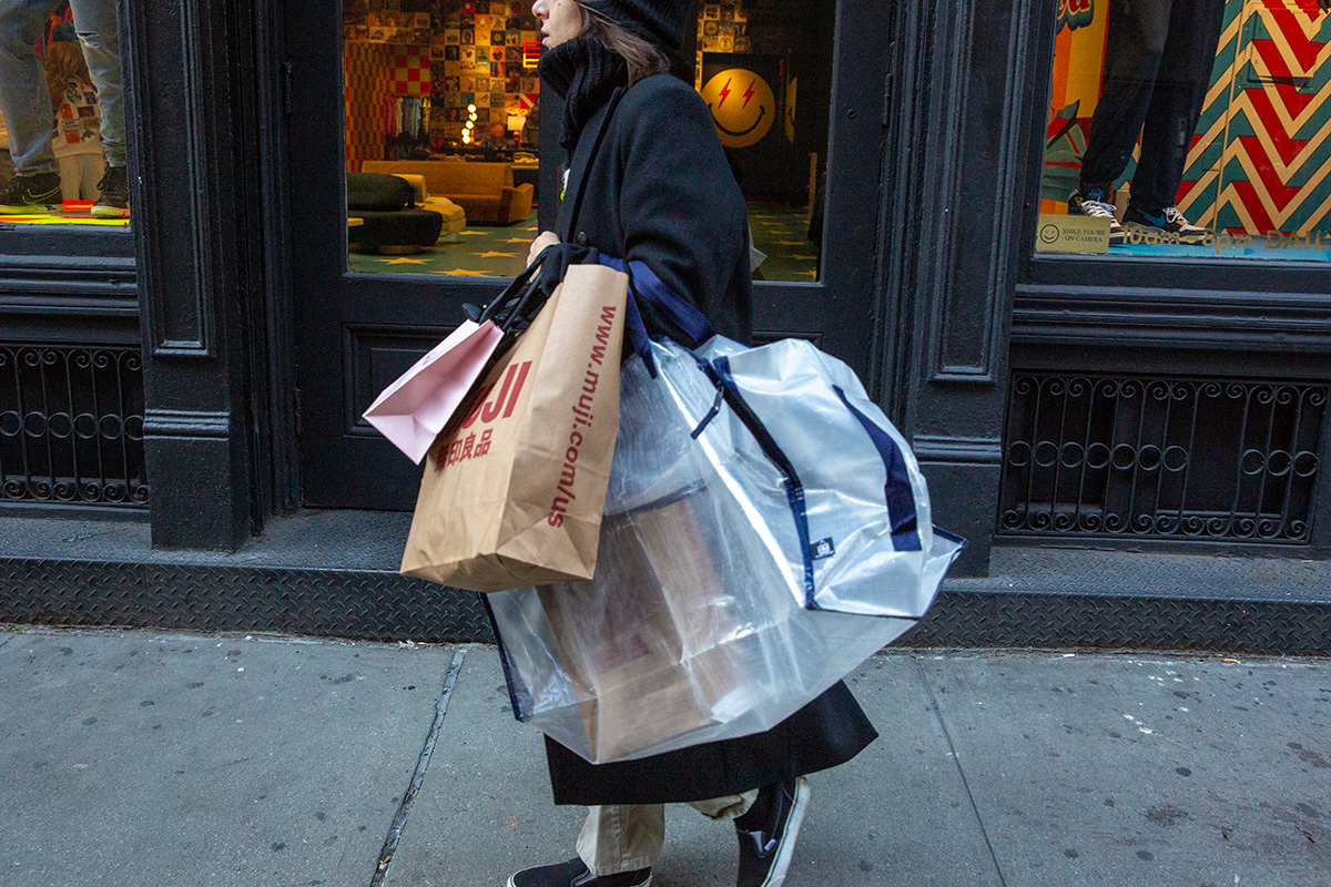 Photo: A shopper in the Soho neighborhood of New York. Photographer: Shelby Knowles/Bloomberg.