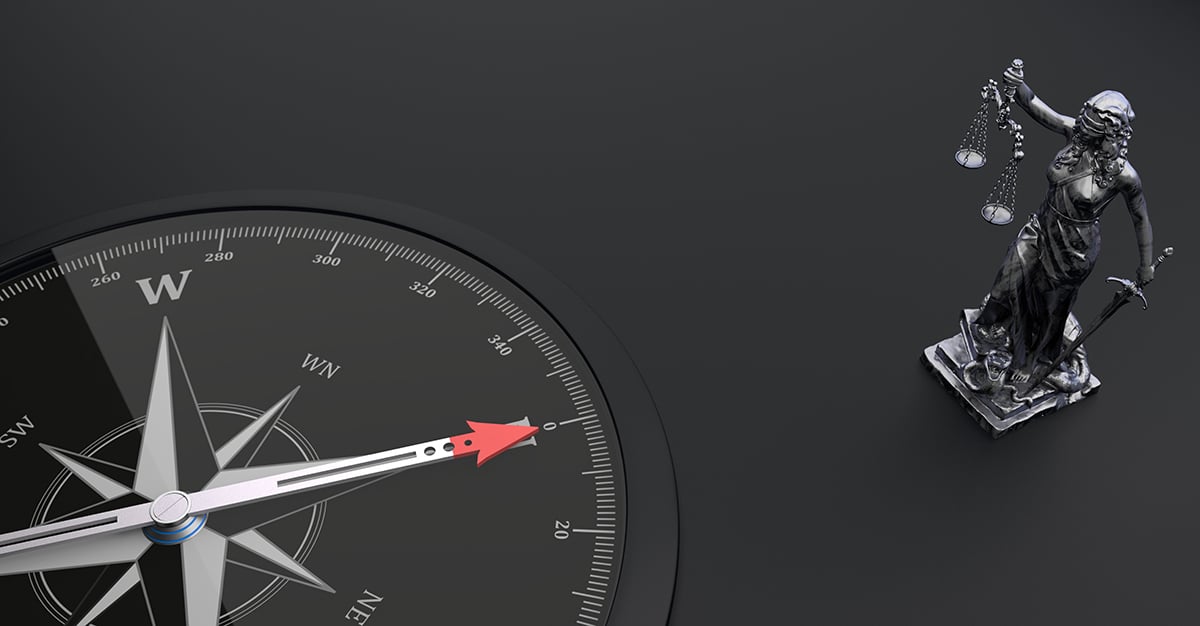 Stock image: Lady justice and a compass. Credit: Alexander Limbach/Adobe Stock