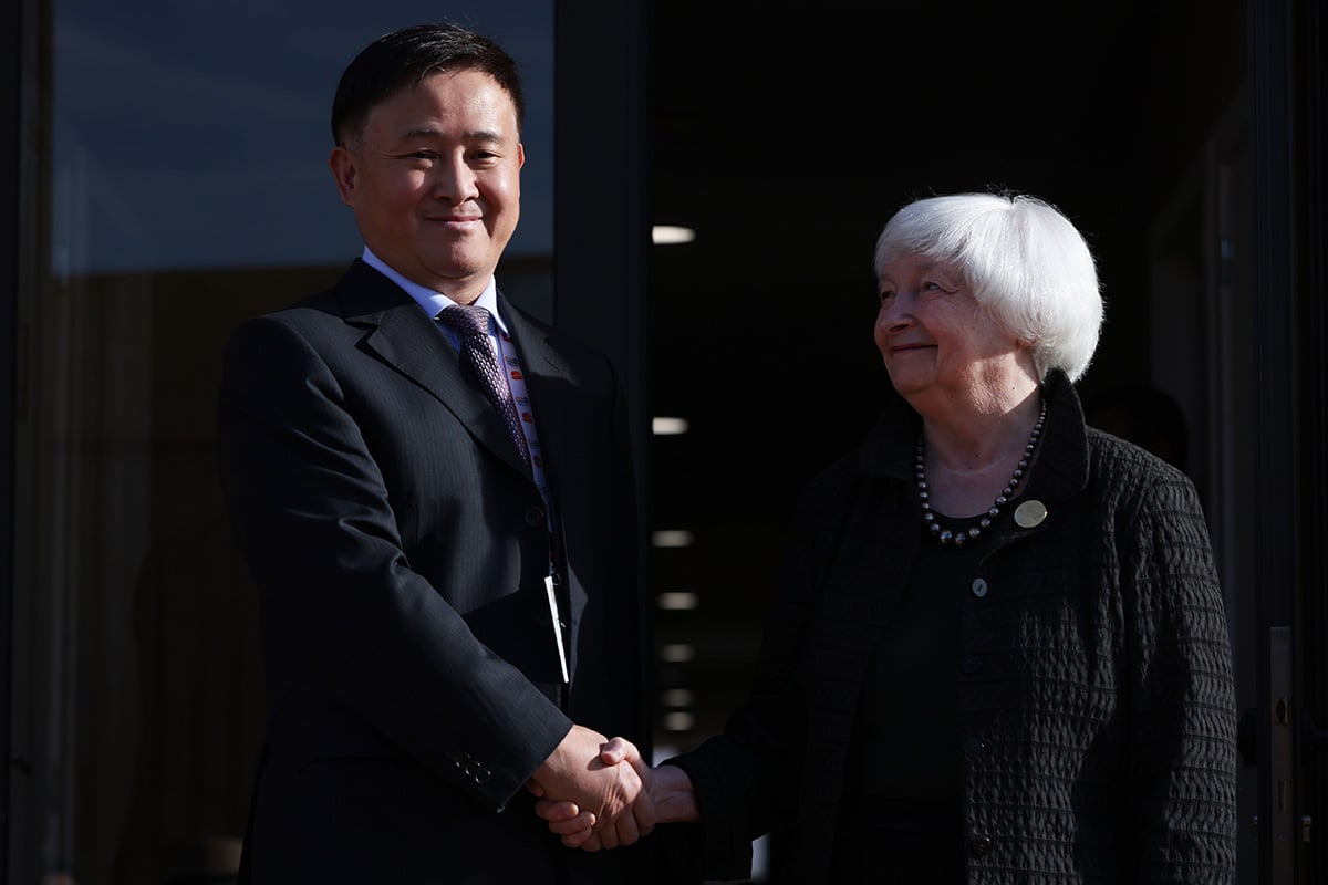 Photo: Pan Gongsheng, governor at the People's Bank of China (PBOC), shakes hands with U.S. Treasury Secretary Janet Yellen in Marrakesh, Morocco, on October 13, 2023.