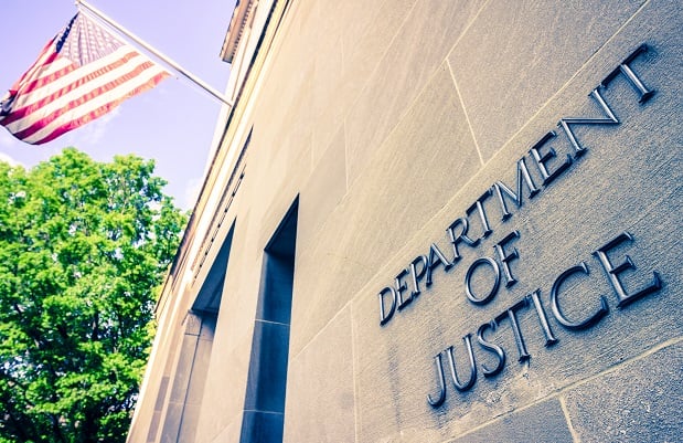Stock photo: Washinton, D.C., April 22 2019: The northern facade of the Department of Justice building in the Nations capital .