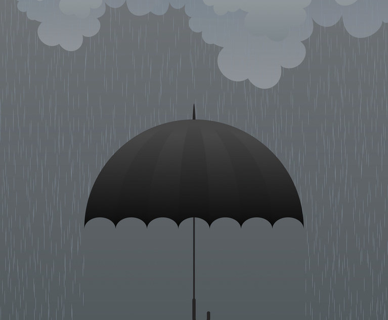 Stock image: Umbrella in rain storm