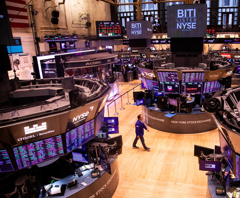 A trader on the floor of the New York Stock Exchange in New York. Photo: Michael Nagle/Bloomberg