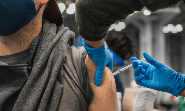 Photo of vaccine being administered