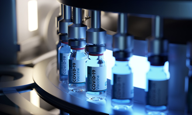 Final production of filled vials of COVID-19 vaccine. Credit: James Thew - stock.adobe.com