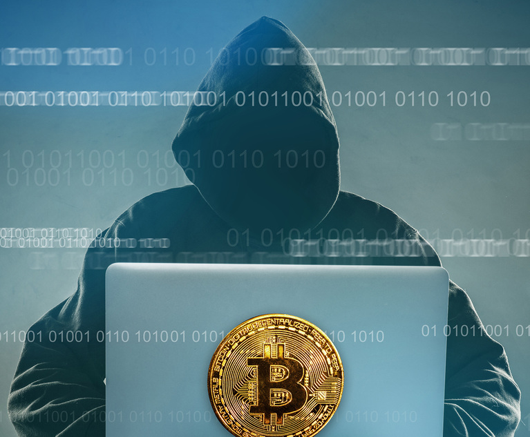 Stock image: Criminal stealing bitcoin