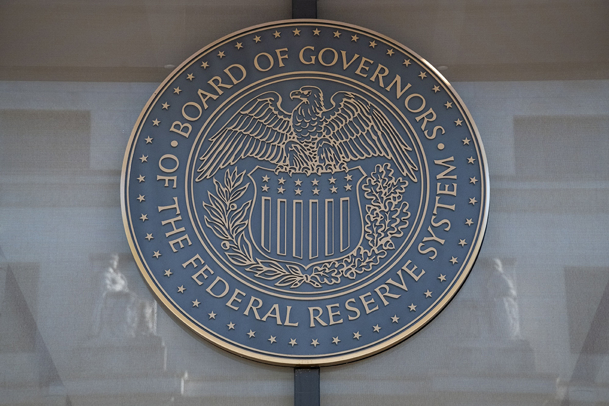 The seal of the US Federal Reserve. Photographer: Graeme Sloan/Bloomberg