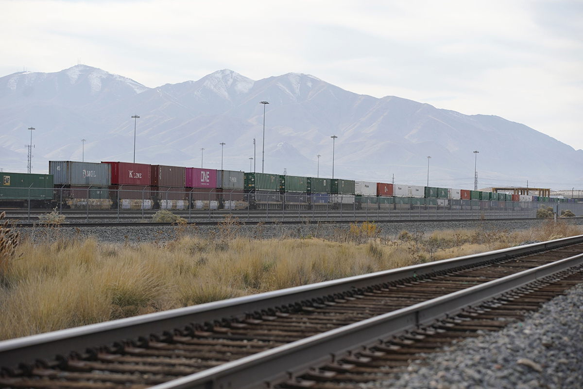 Photo: A freight train carrying shipping containers travels toward the Union Pacific Intermodal Terminal in Salt Lake City, Utah, on November 4, 2021. Photographer: George Frey/Bloomberg