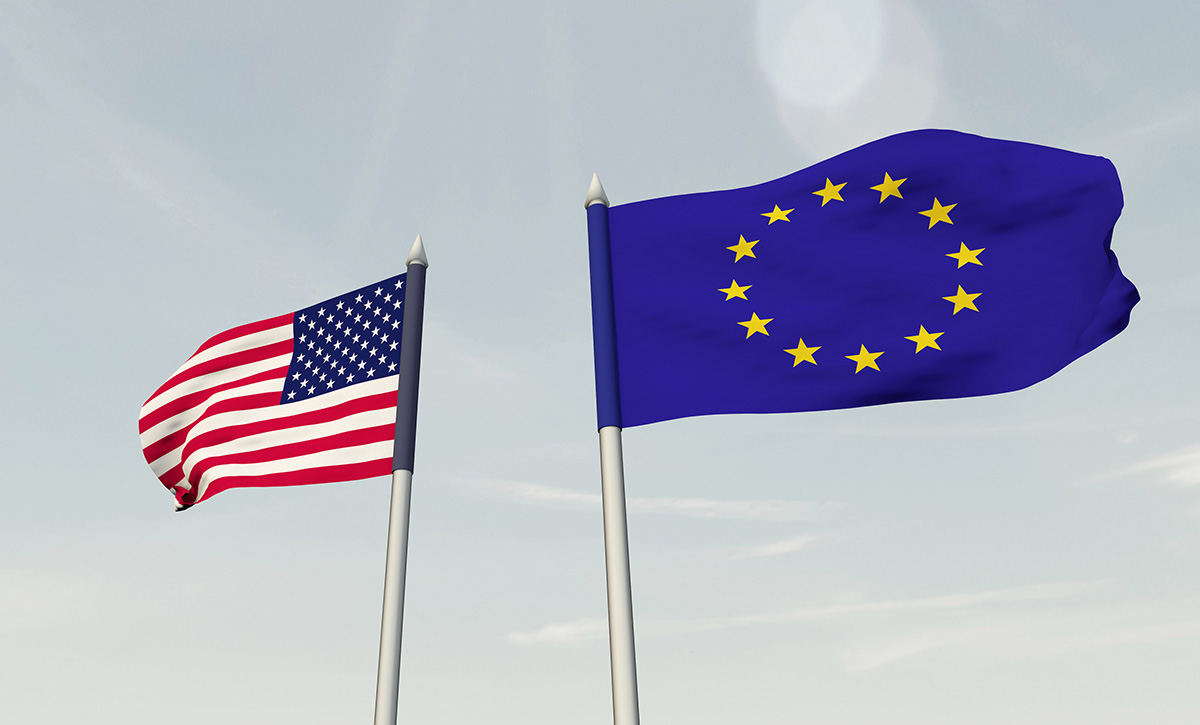 Horizontal illustration of Flags of United States of America and European Union hanging on poles, waving in the wind in different directions. Credit: alexx_60/Adobe Stock