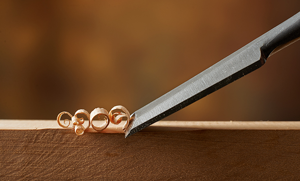 Stock photo: Chisel creating wood shavings