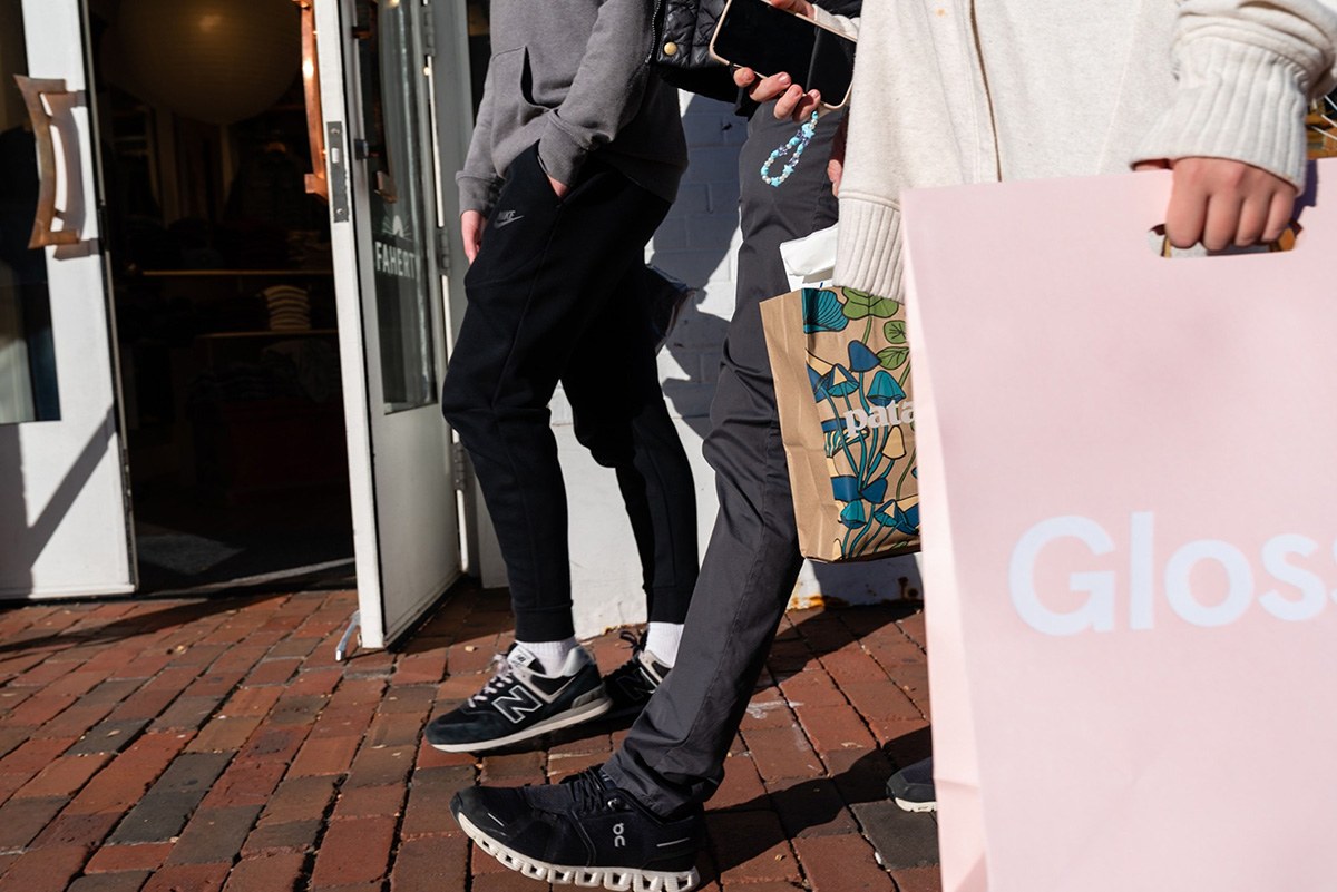 Stock photo: Pedestrians carry shopping bags in the Georgetown neighborhood of Washington, D.C., on November 9, 2022.