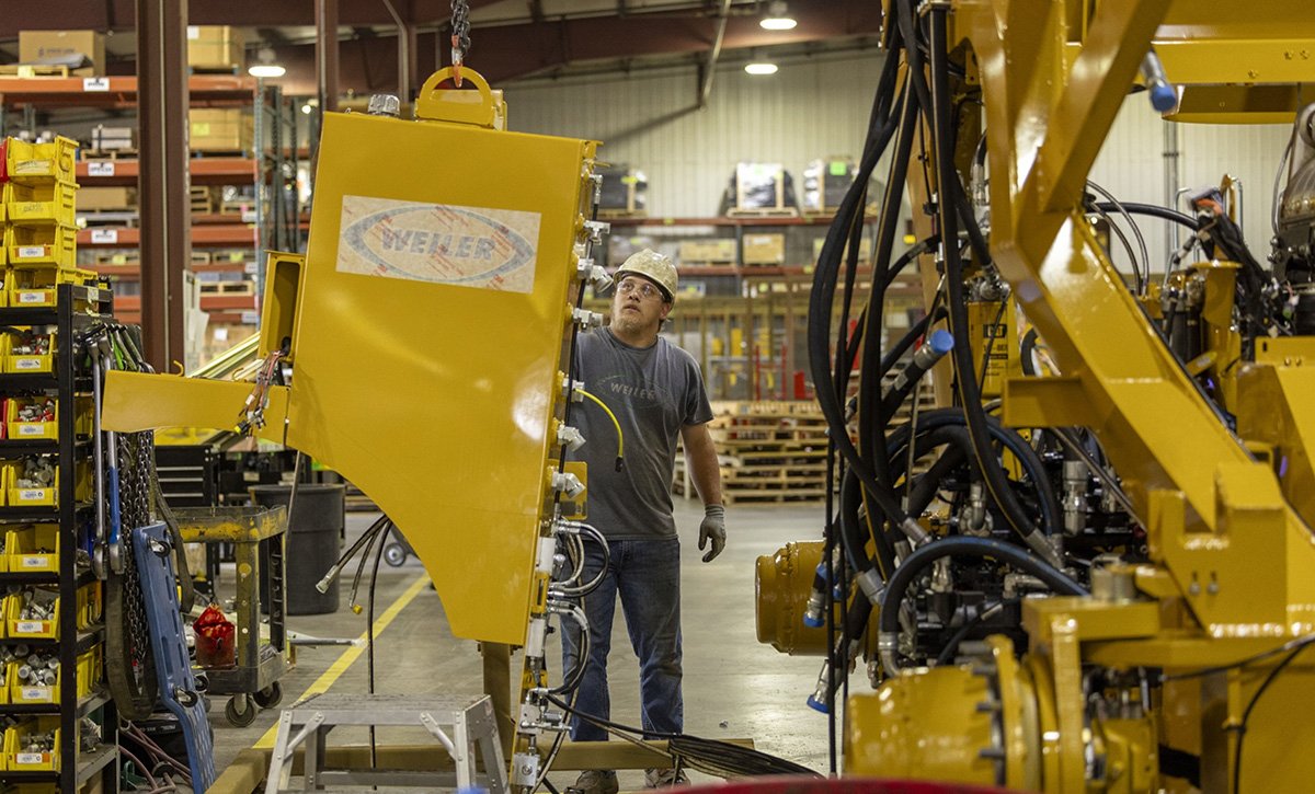 Photo: Kyle Kersbergen works on heavy machinery at Weiler, a manufacturing factory in Knoxville, Iowa, on July 21, 2023. Photographer: Rachel Mummey/Bloomberg