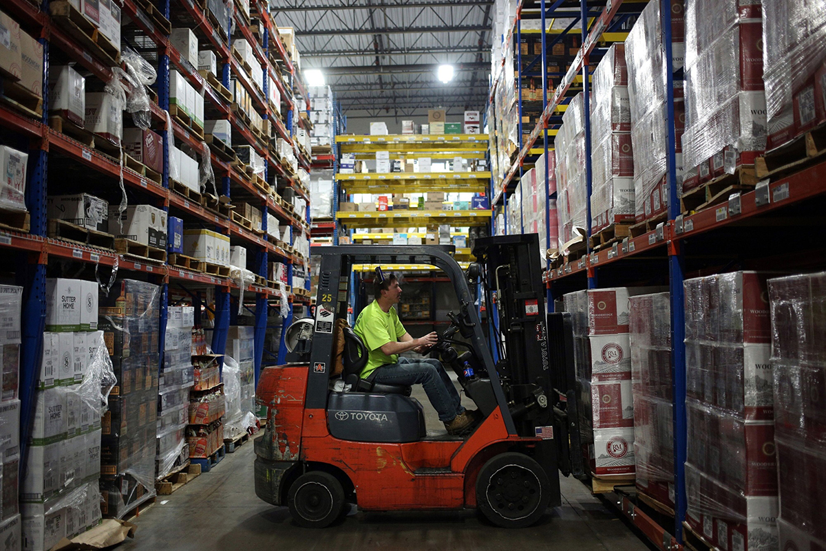 Photo: A worker uses a forklift to move a pallet at a distribution warehouse in Louisville, Kentucky. Photographer: Luke Sharrett/Bloomberg