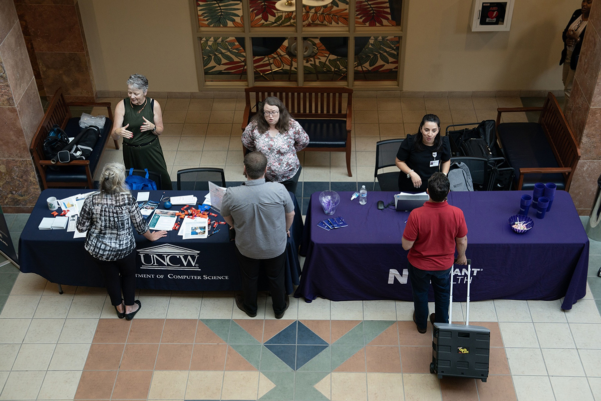 Photo: Job seekers attend a career fair in North Carolina. Photographer: Allison Joyce/Bloomberg