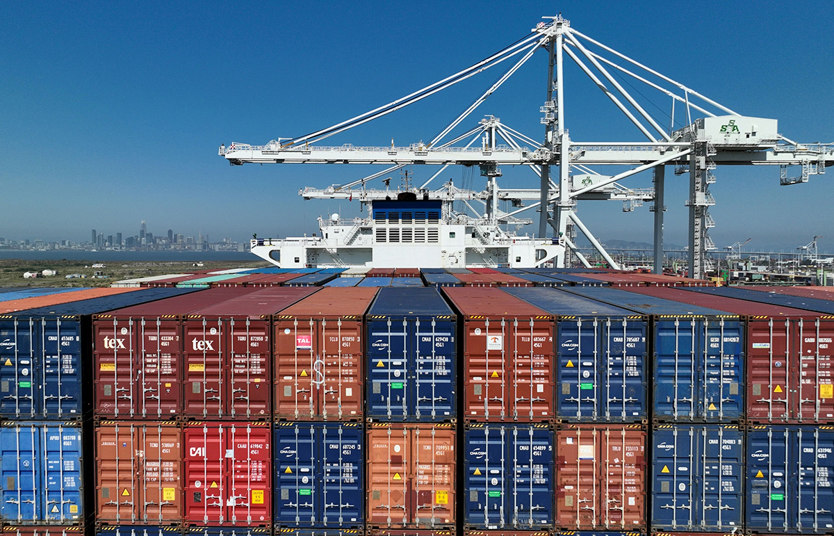 Photo: Shipping containers sit stacked on a container ship docked at the Port of Oakland, California, on August 7, 2023. (Photo by Justin Sullivan/Getty Images)