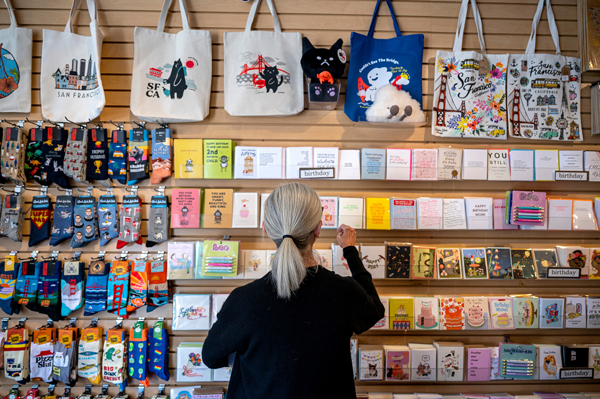 Photo: A worker arranges greeting cards at a store in San Francisco on June 7, 2024. 