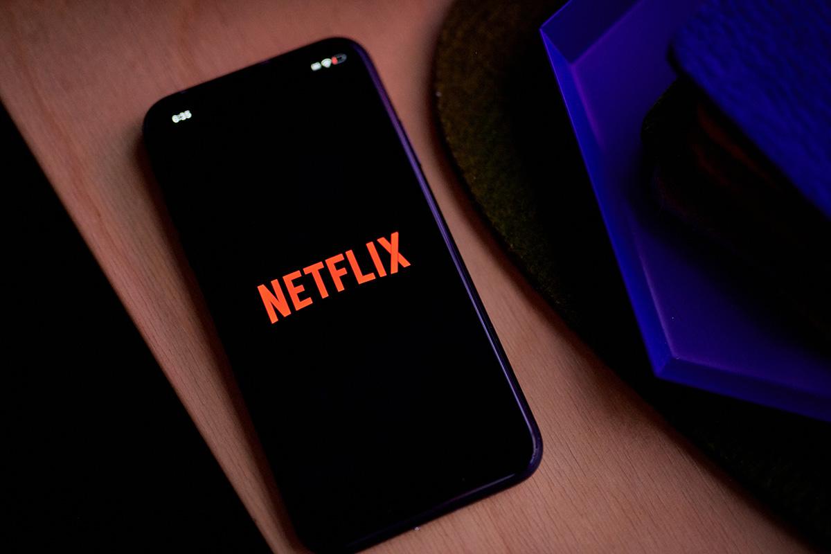 Photo: The Netflix logo on a smartphone arranged in the Queens borough of New York City on March 26, 2024. Photographer: Gabby Jones/Bloomberg.