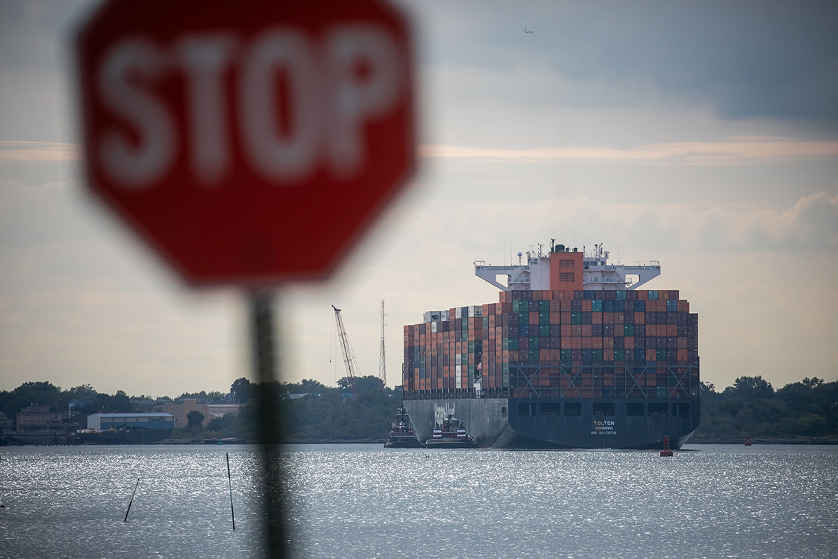 Photo: A container ship leaves the Port of Newark in Elizabeth, New Jersey, on September 30.