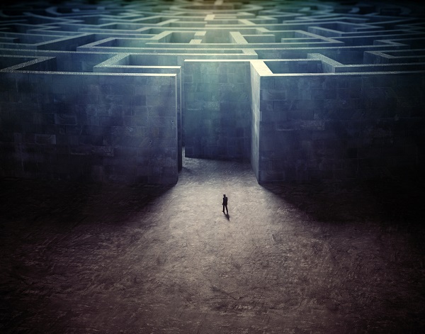 Stock illustration: Man facing a maze