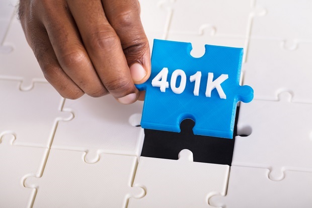 Stock image: 401(k) puzzle piece fitting into puzzle
