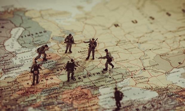 Stock image: Soldiers on a map of Eastern Europe