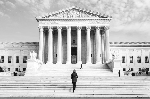 supreme court building with person walking up the stairs (Photo: Shutterstock)