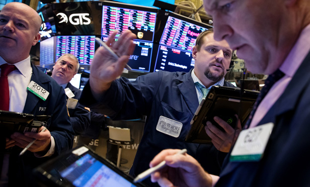 Traders at the New York Stock Exchange